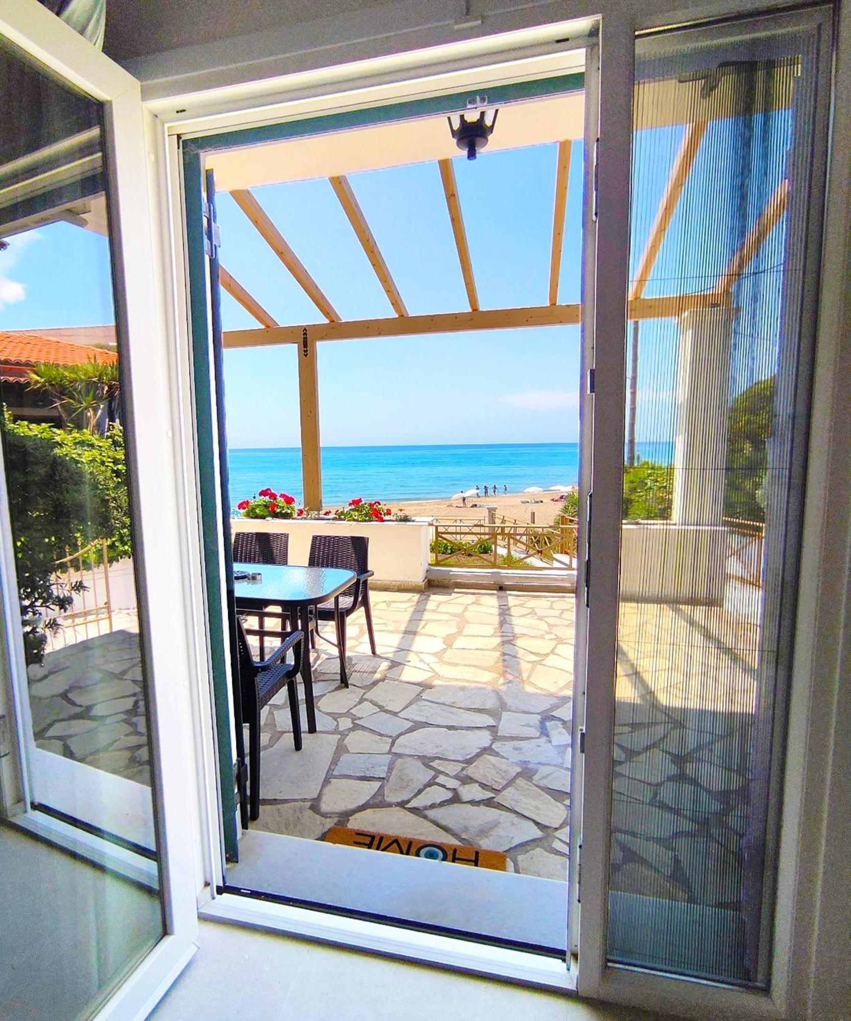 Beachfront 4-bed Luxury - Agios Gordios, Corfu, Greece